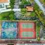 aerial photography of four basketball courts